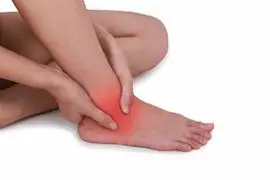 Person suffering from foot pain image
